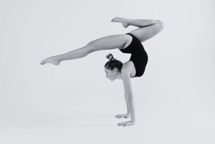 Gymnast stag handstand
